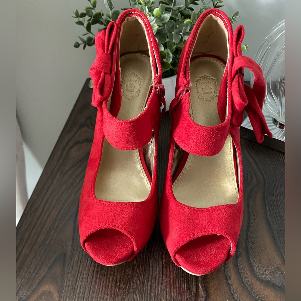 Ollio Red platform open toe high heel with ribbon accent.